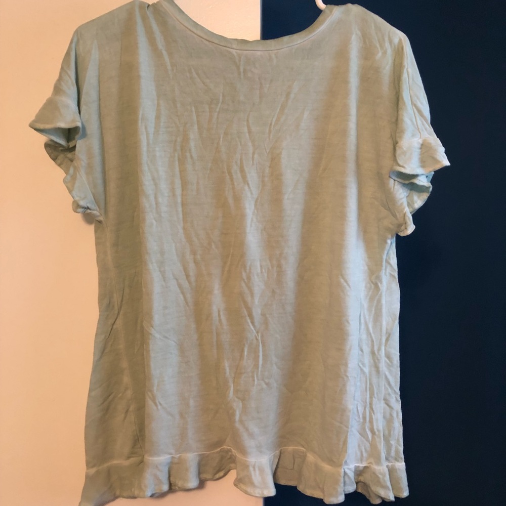 Francesca’s tulip back shirt